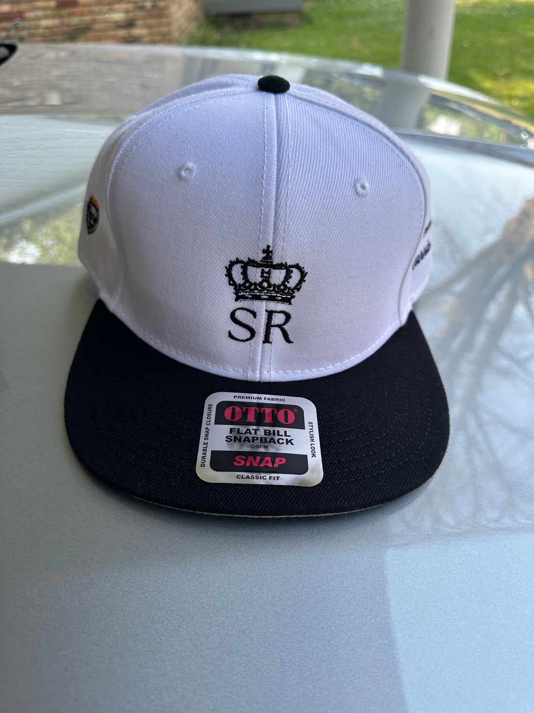 THSR White and black SnapBack with Black “SR” under black crown