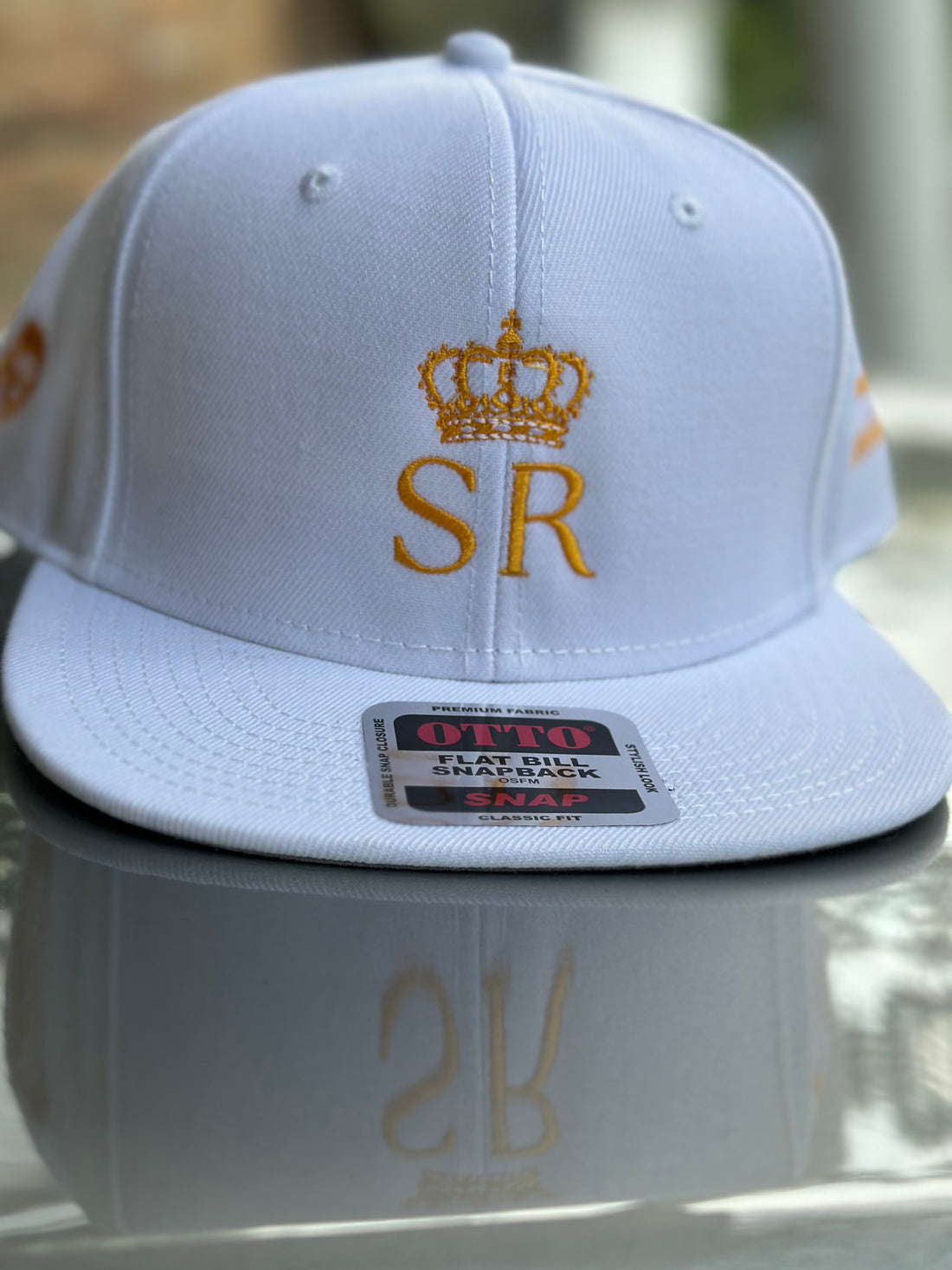 THSR White SnapBack with Gold “SR” under a gold crown